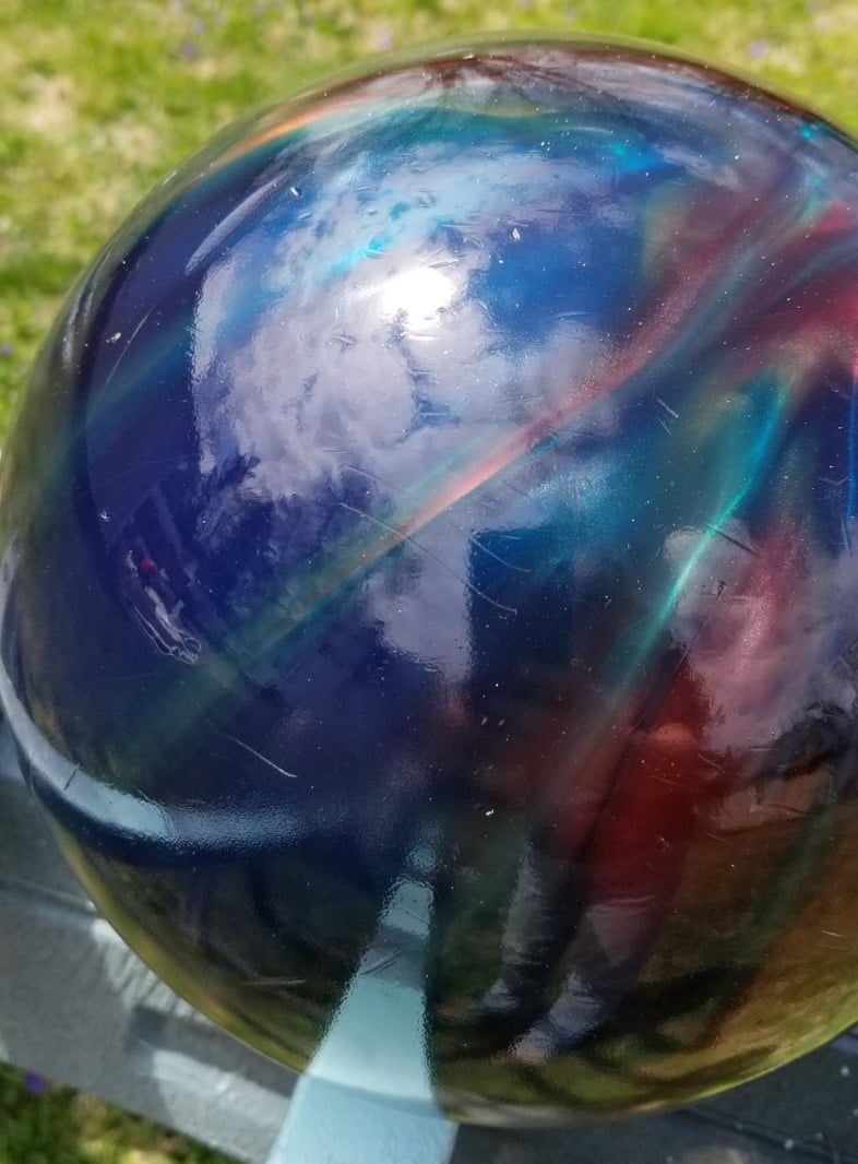 colorful bowling ball turned into a diy gazing ball