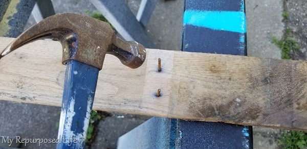 tap nails out of pallet board