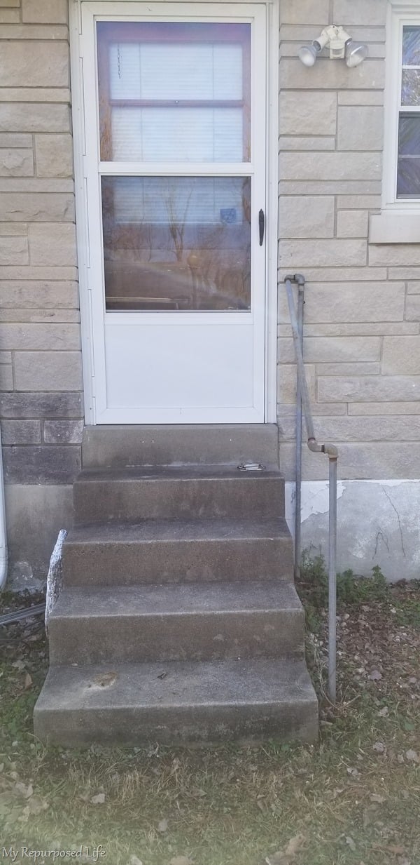 ugly concrete steps disguised with small deck