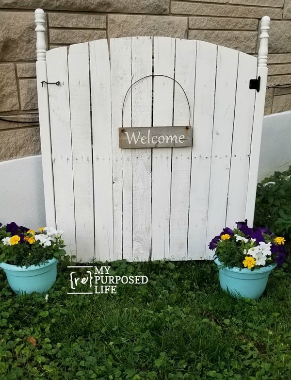 gas meter cover that eyesore with a faux garden gate MyRepurposedLife