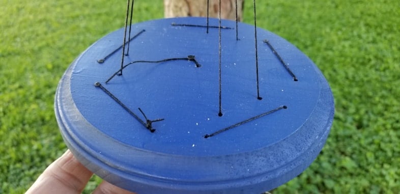 top of windchime showing where threads are tied