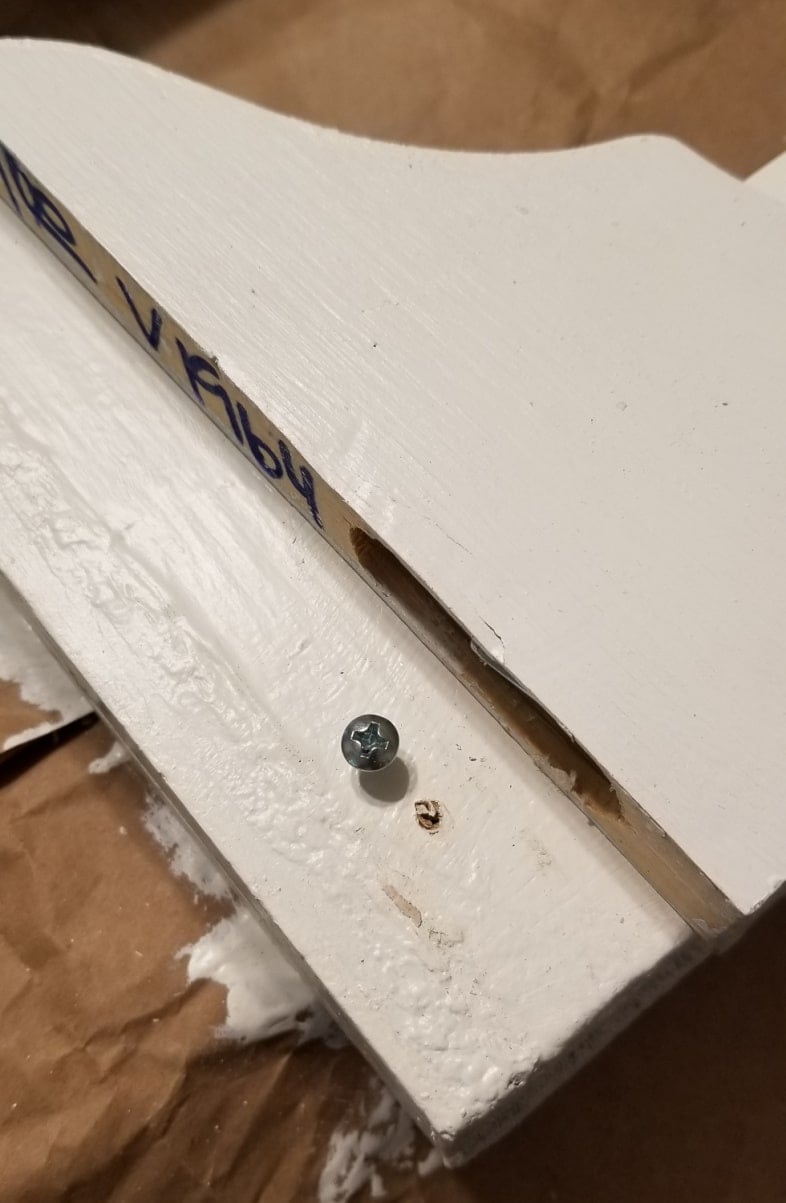 install small wooden brackets to the base of the window frame
