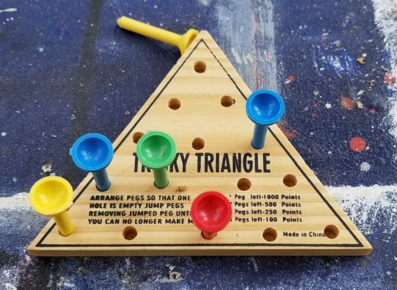 tricky triangle peg game pegs