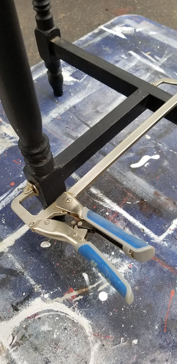 clamp old table leg while wood glue sets up