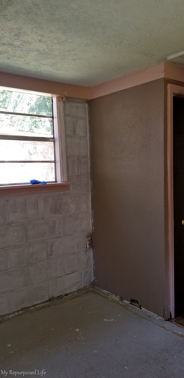 painting concrete cinder block wall by hand