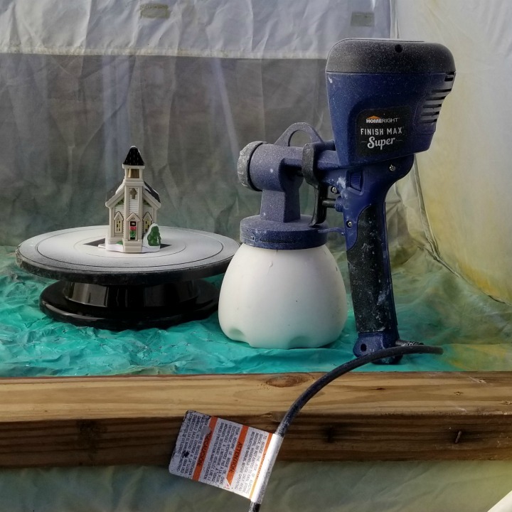 church Christmas village paint sprayer