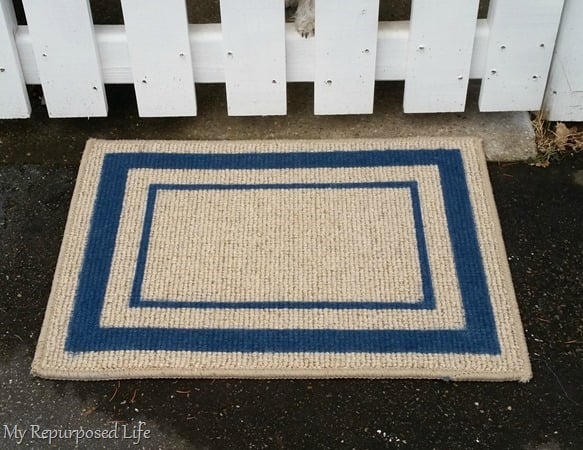 spray painted welcome mat