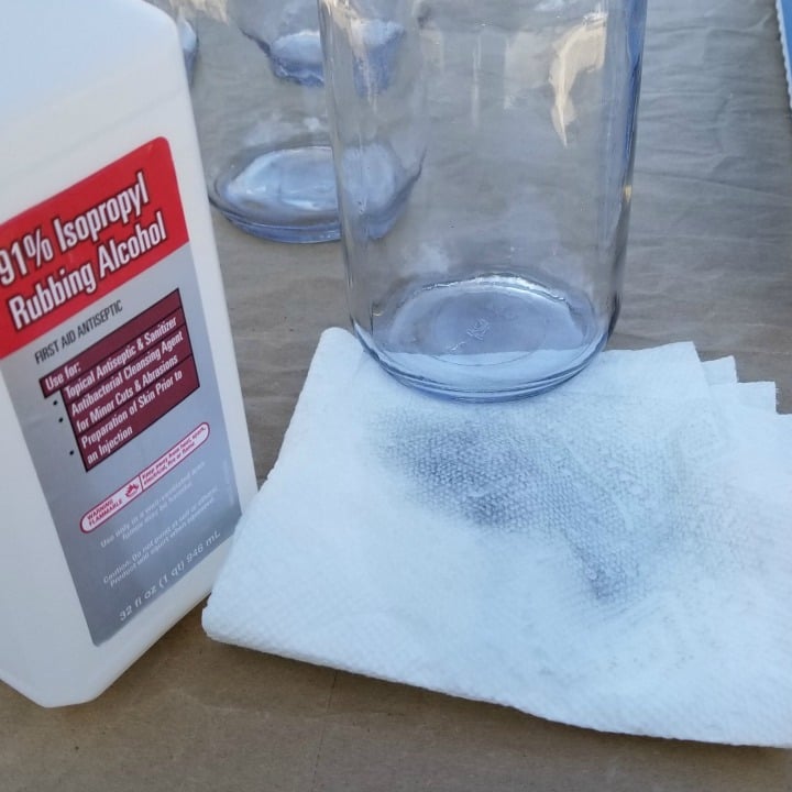wipe glass with alcohol
