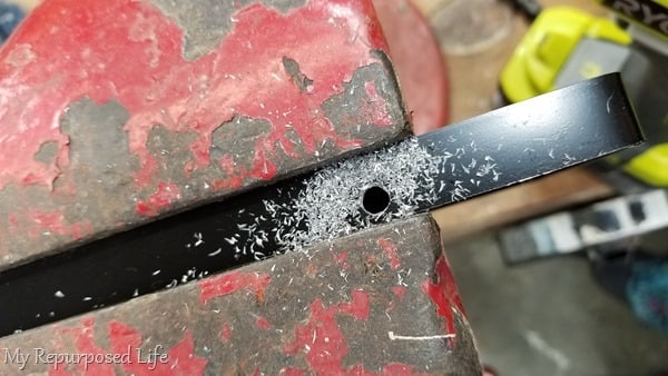 drill hole in metal bracket