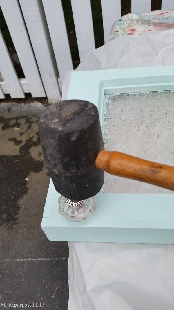 a rubber mallet used to tap in knobs