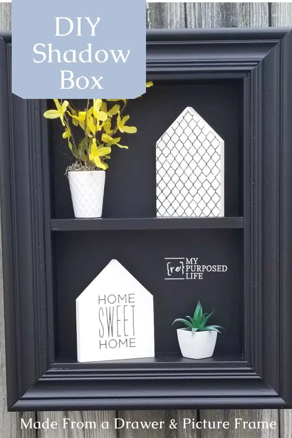 How to use an old drawer and a picture frame to make a shadow box. Step by step directions so you can make this project yourself. The black shadow box looks great with the white decor #MyRepurposedLife #repurposed #drawer #shadowbox #diy #project via @repurposedlife