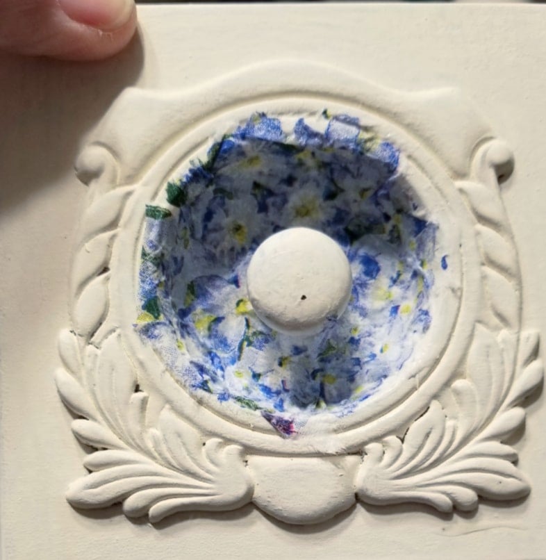 napkin in place around the knob