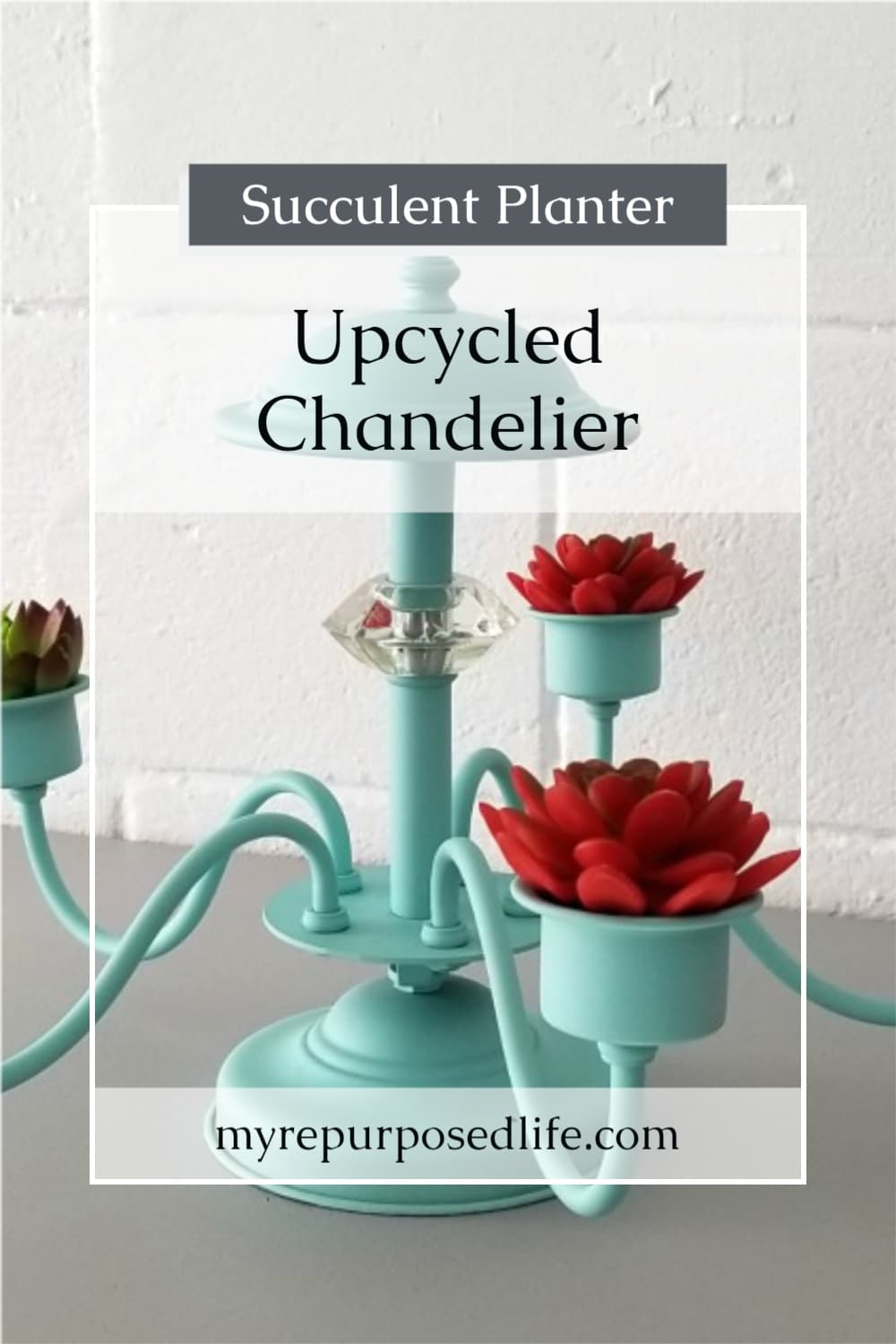 How to make a repurposed chandelier succulent planter that is interchangeable from hanging to setting on a table as a centerpiece. You could easily change this out with candles or potted plants. Spray painting a brass chandelier really gives you so many options to match your decor. #MyRepurposedLife #repurposed #chandelier #succulent #planter via @repurposedlife