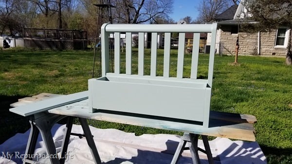 paint toy box bench green with paint sprayer