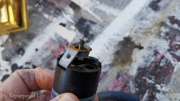 remove socket from brass vanity light