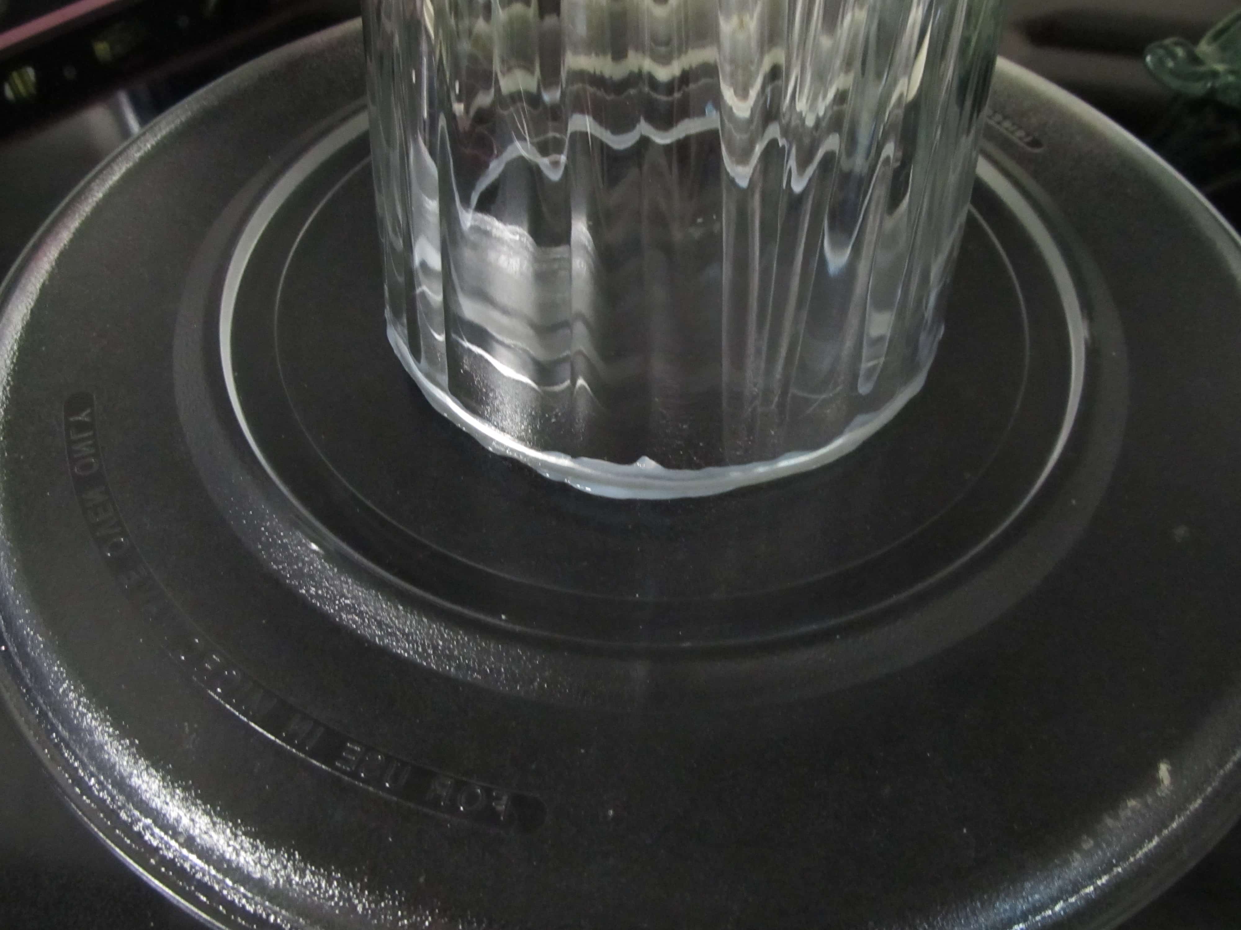 adhesive oozing out between vase and platter