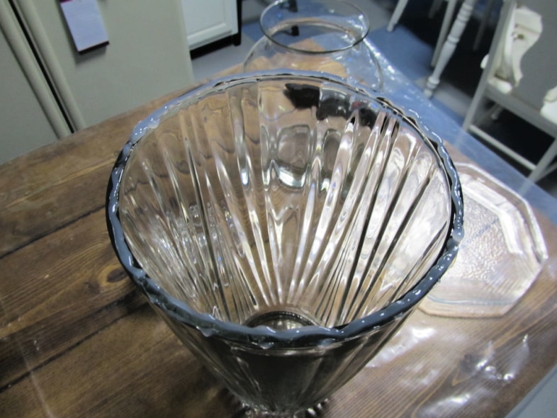vase with adhesive on the rim to make a totem