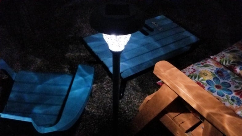 repurposed lamp solar light lit in the darkenss