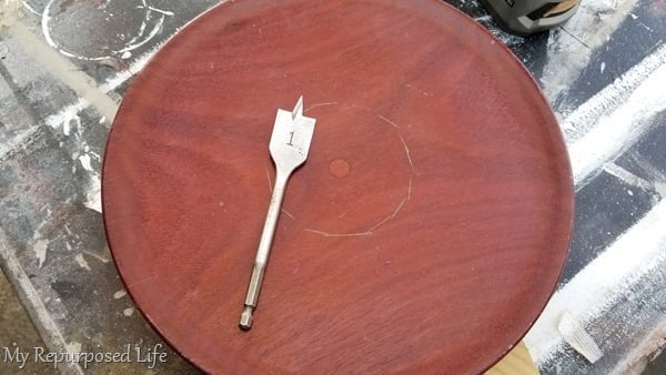 paddle bit on wooden platter