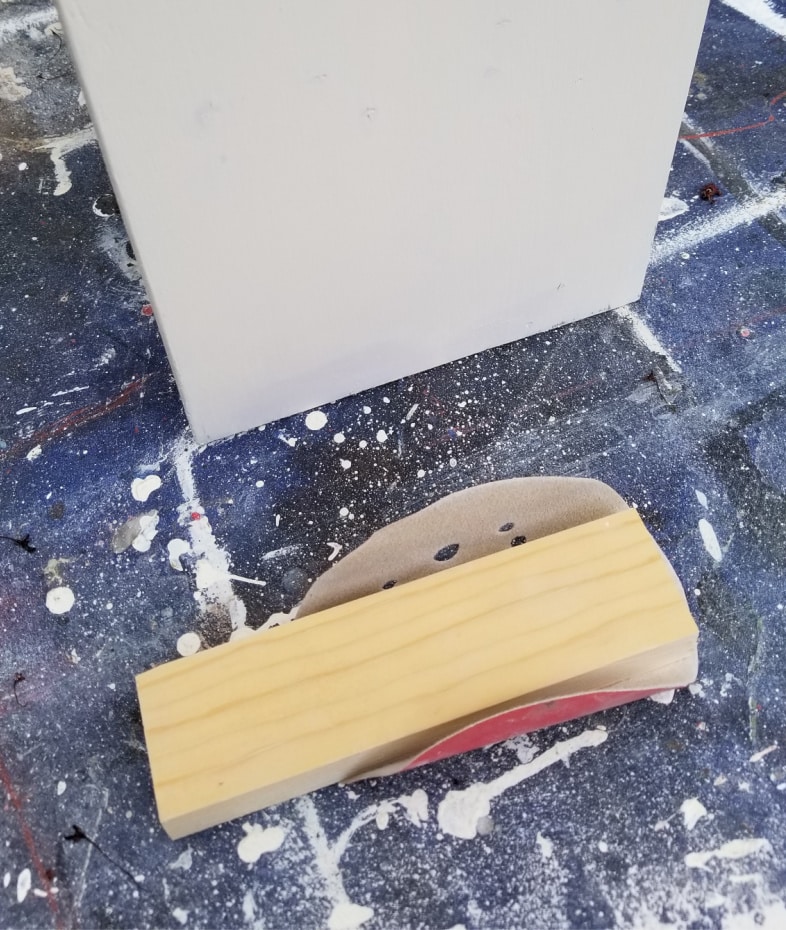 sanding  block removes drywall patching
