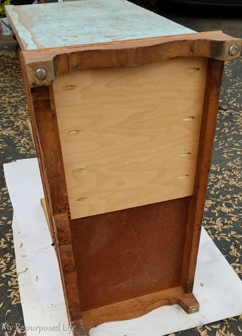 sanding side of record radio cabinet