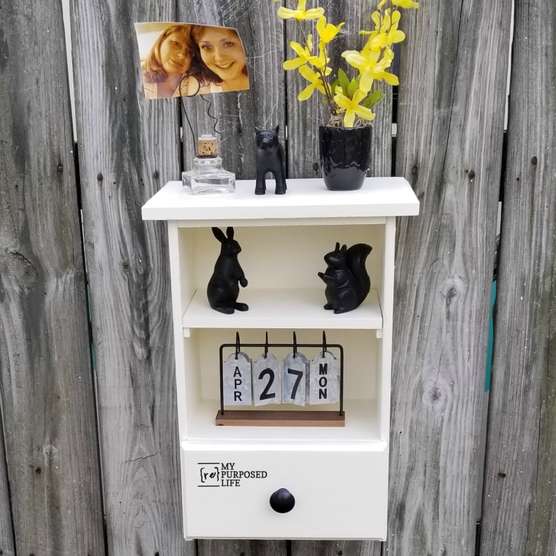 small white wall cabinet made from repurposed drawers MyRepurposedLife