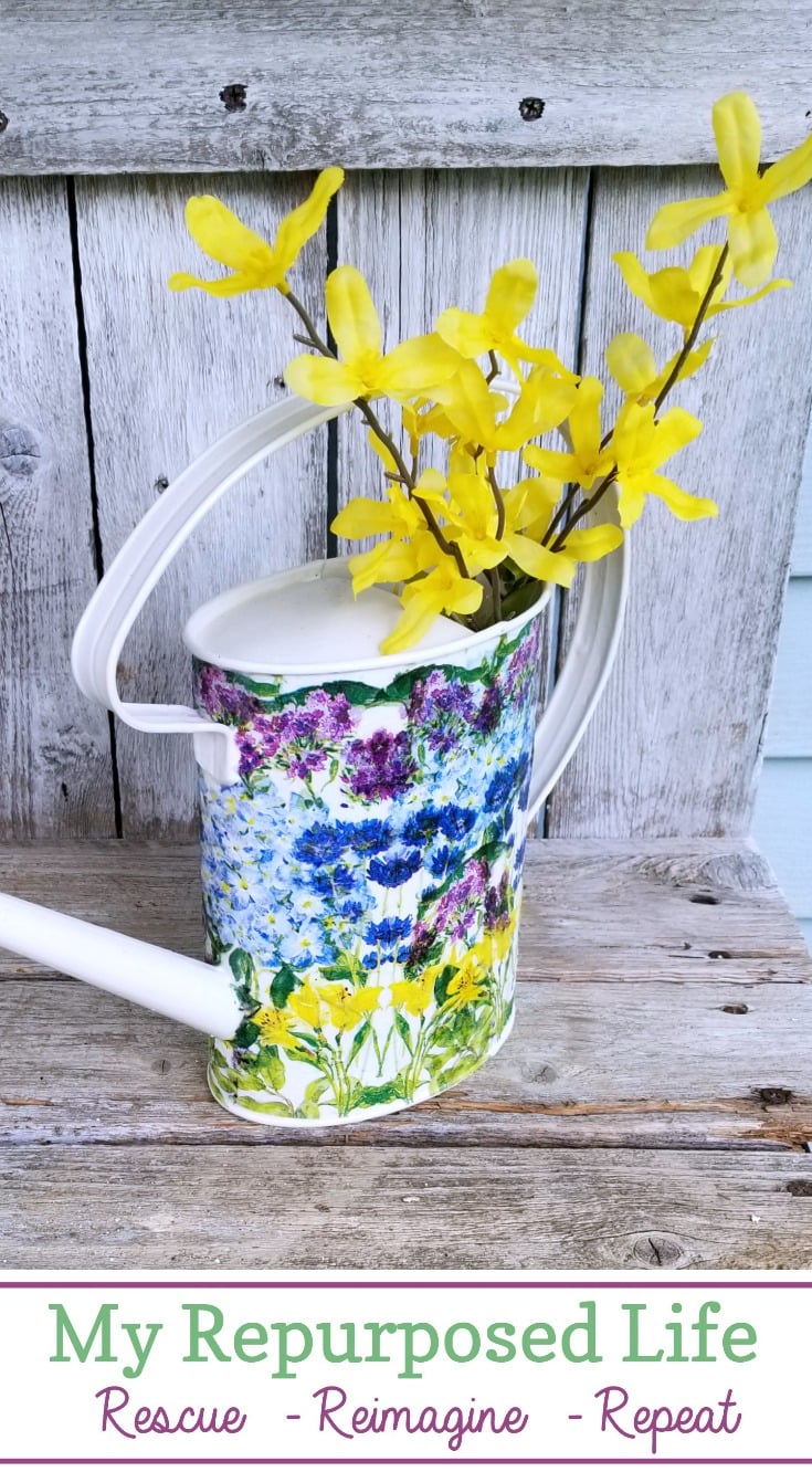 How to decoupage a watering can using pretty floral napkins. This easy craft can be done in just a couple of hours. Do more than one to make a set. Great for displaying cut flowers indoors. #MyRepurposedLife #repurposed #wateringcan #decoupage #craft via @repurposedlife