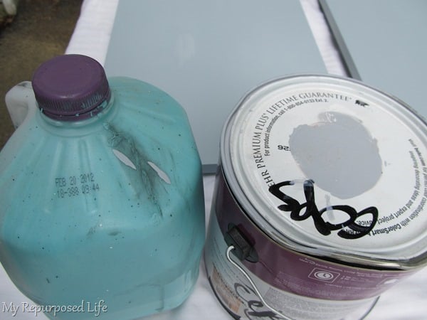 paint in milk jug