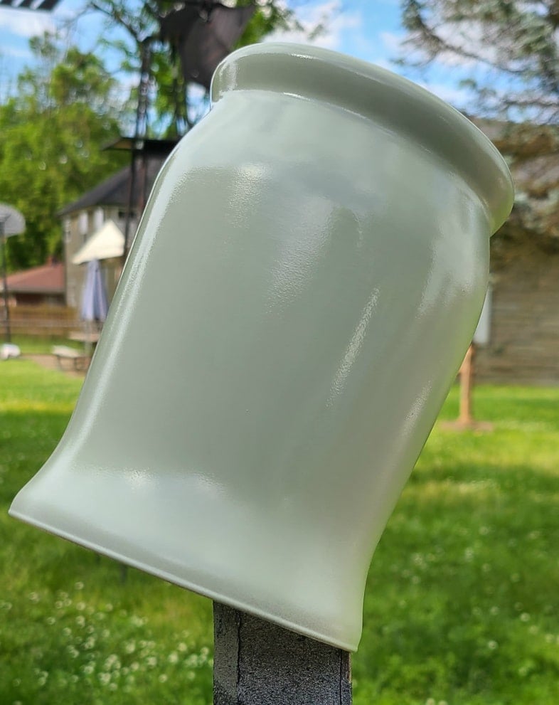 spray painted vase on stake