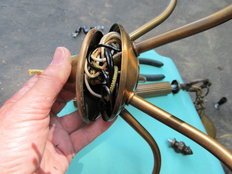 remove all of the electrical wires from the chandelier