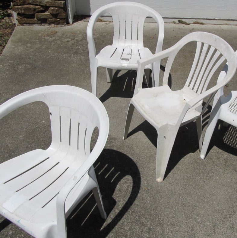 white plastic patio chairs