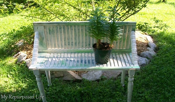 repurposed shutter bench for plants