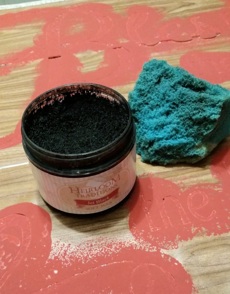 apply wax over stencil with sponge