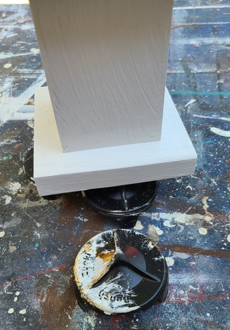use painting pyramids to hold pedestal off the table while painting