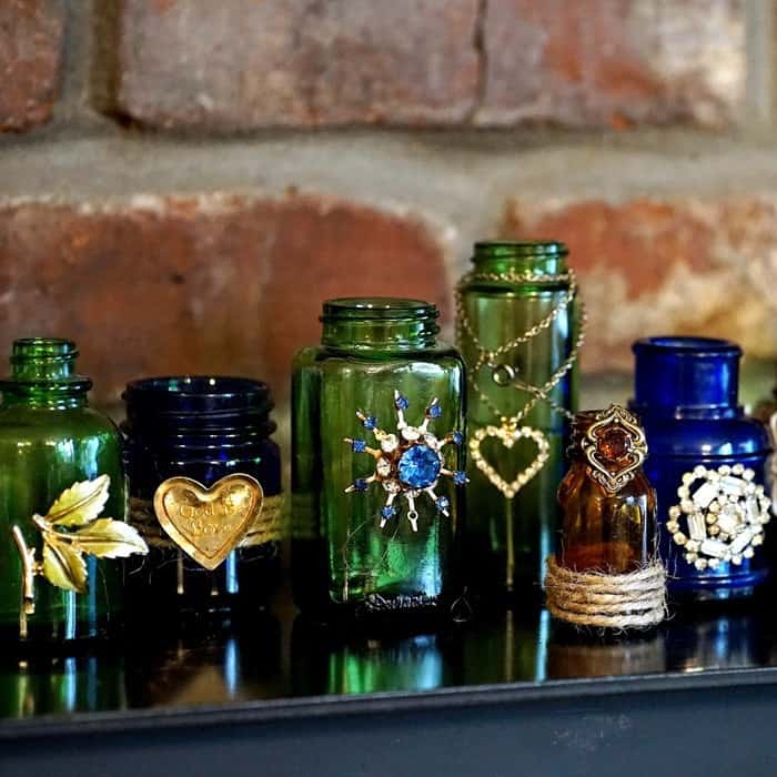 make some bottles with bling - vintage jewelry