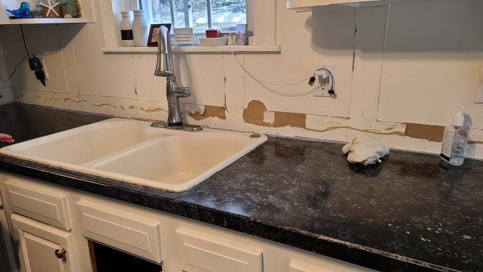 old countertop ripped out backsplash