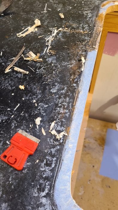 scraper tool with shavings on counter