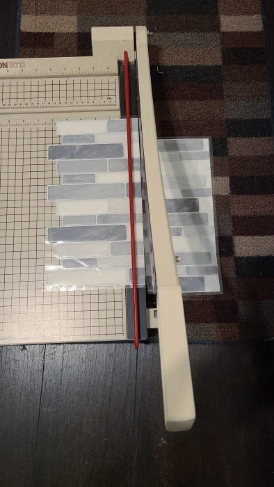 use a paper cutter for peel and stick backsplash