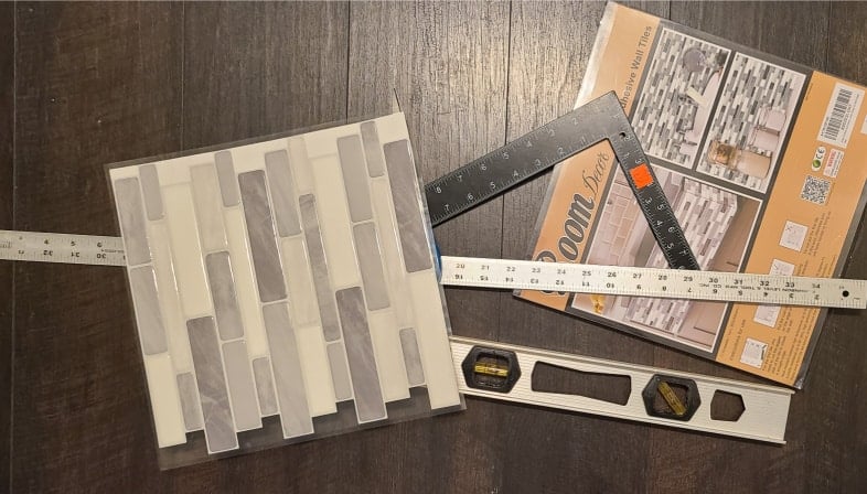 peel and stick wallpaper yardstick, level, metal square