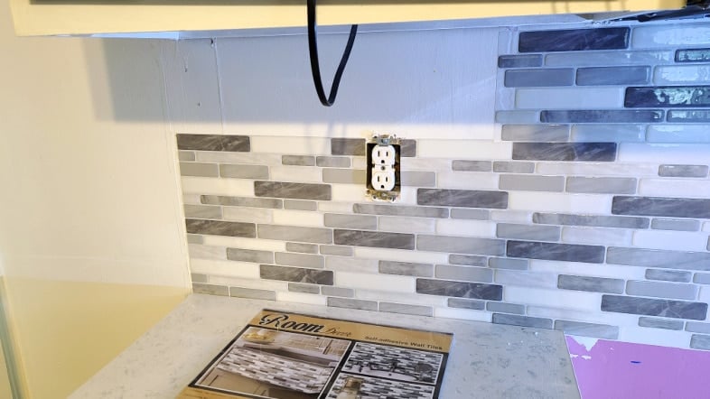 peel and stick backsplash nearly finished
