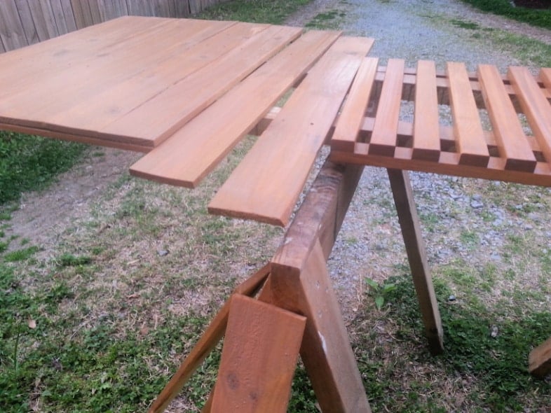 wood pieces laid out in a row to be stained