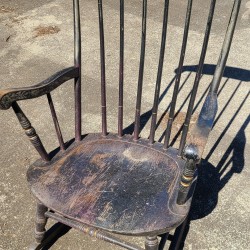 wooden rocking chair in bad shape