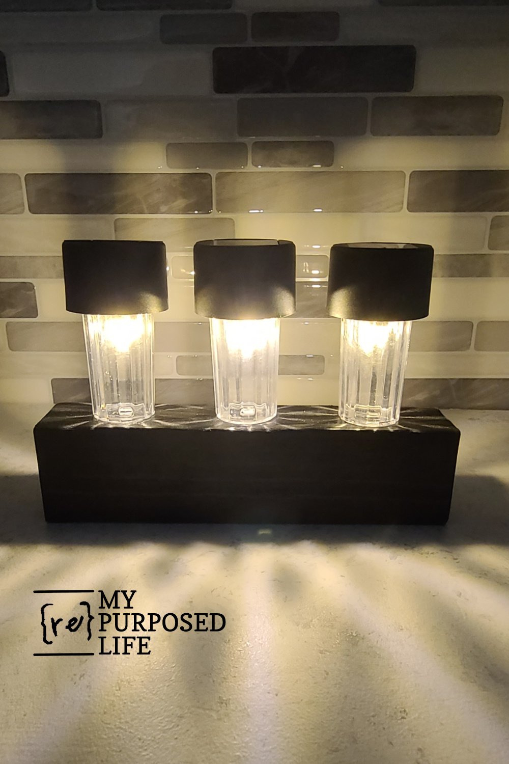 Dollar Store Solar Lights and Scrap wood. Easy project for beginners, so many possibilities for using this kind of light feature. #MyRepurposedLife #solar #lightfeature via @repurposedlife