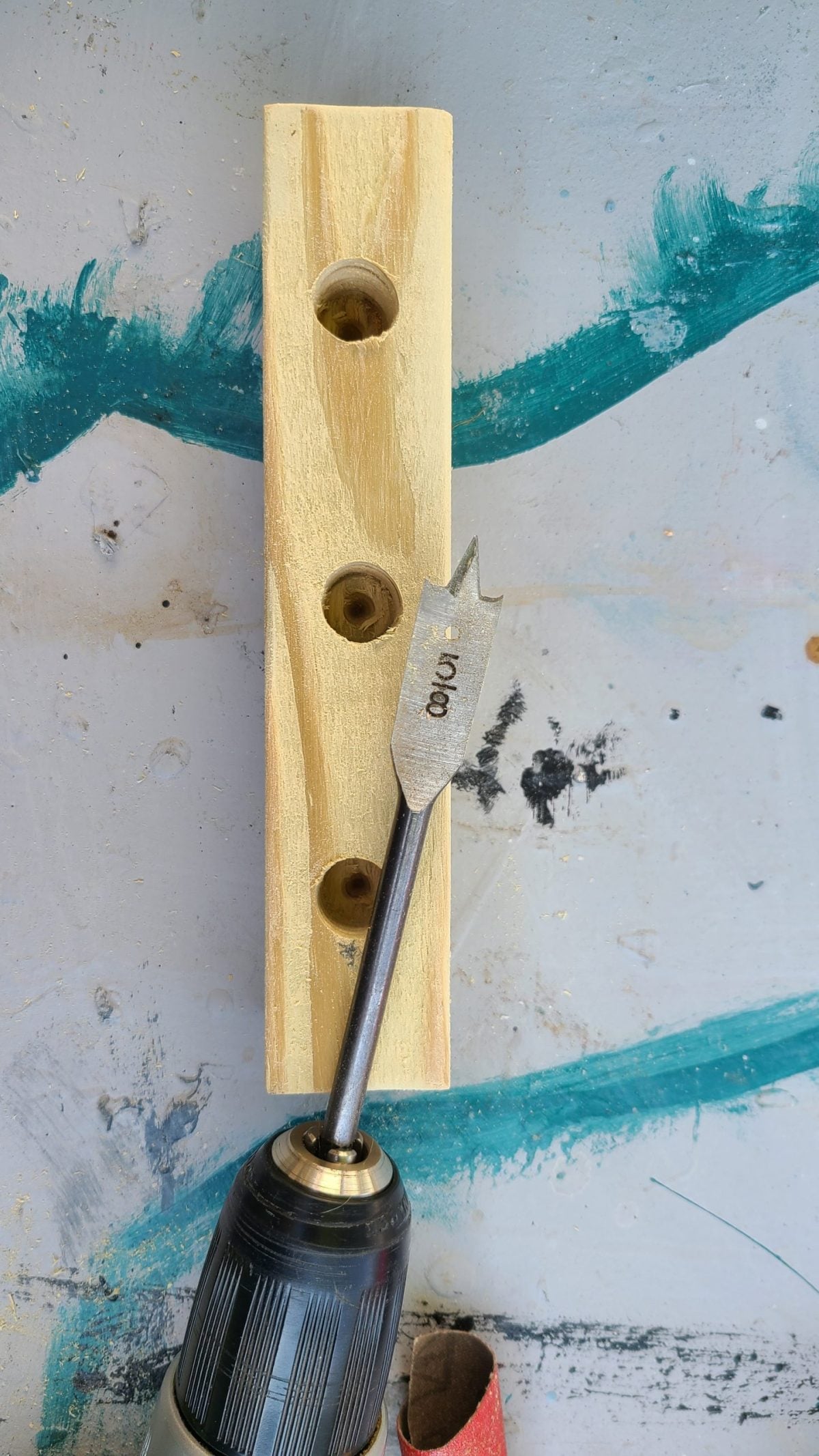 drill scrap wood to hold solar lights