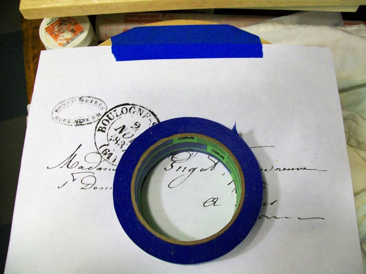use painter's tape to secure pencil transfer