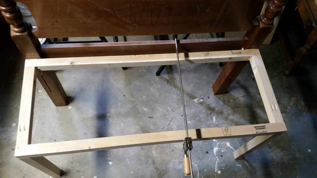 assembling small black bench