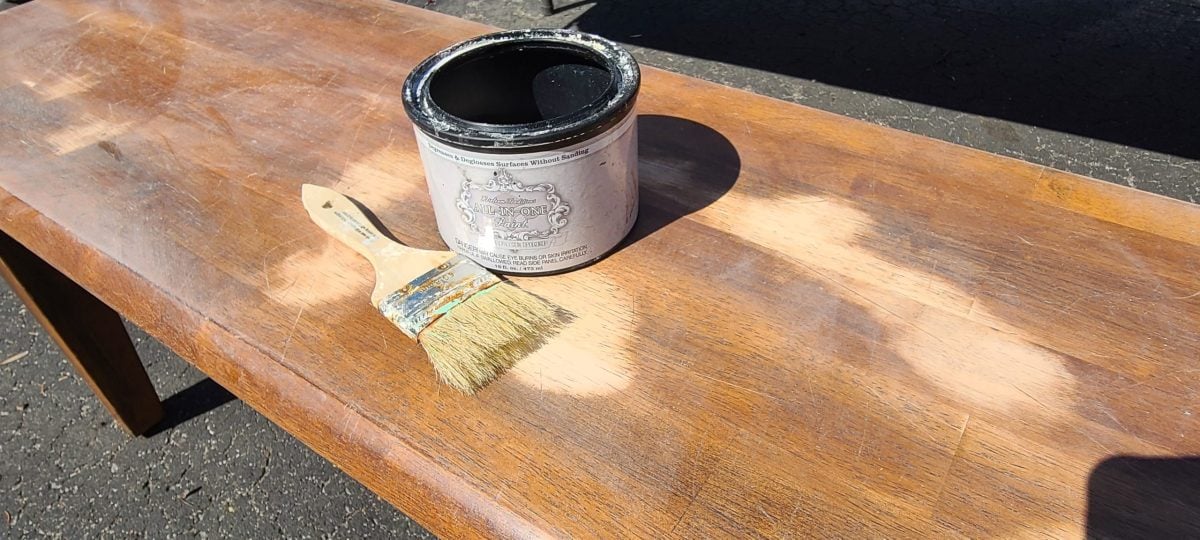 degosser on wood bench