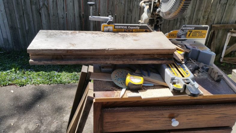 large boards on the miter saw stand