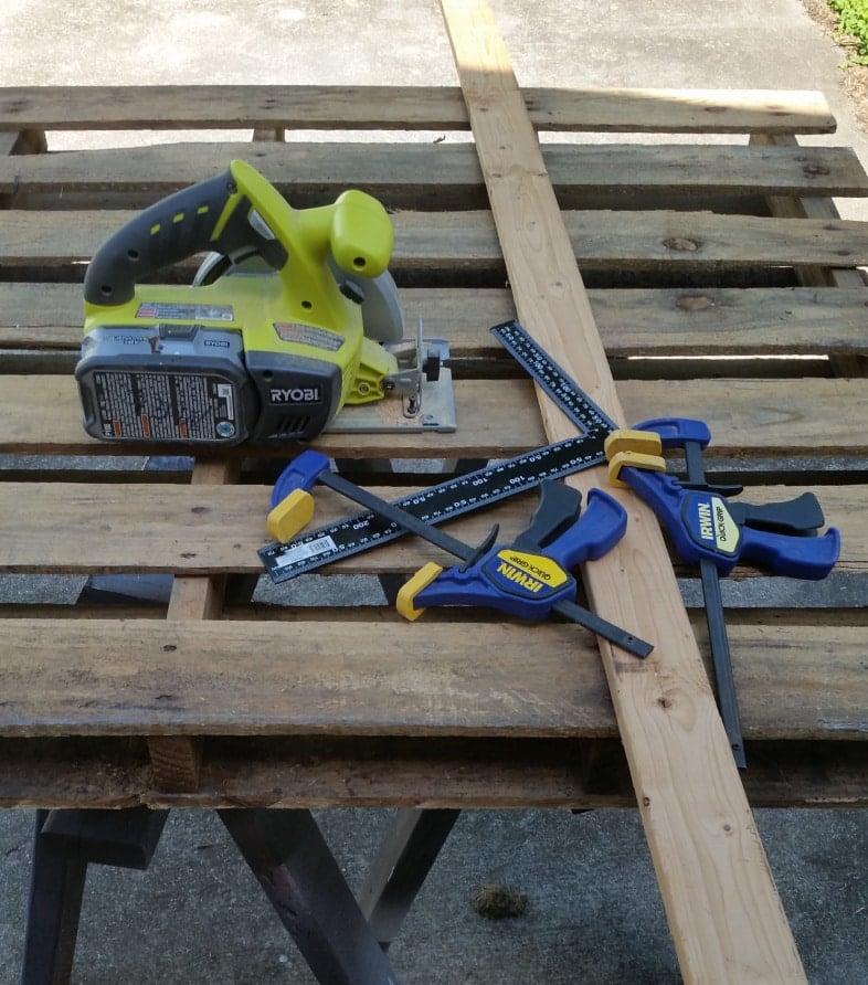 pallet with saw and clamps