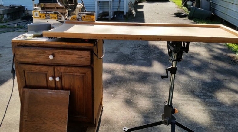 short board on miter saw after being cut